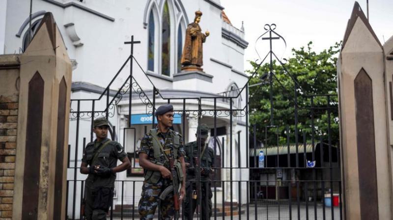 Sri Lankan soldiers stand guard outside a closed church in Colombo on April 28, 2019, a week after a series of bomb blasts targeting churches and luxury hotels on Easter Sunday in Sri Lanka.(Photo: AFP)