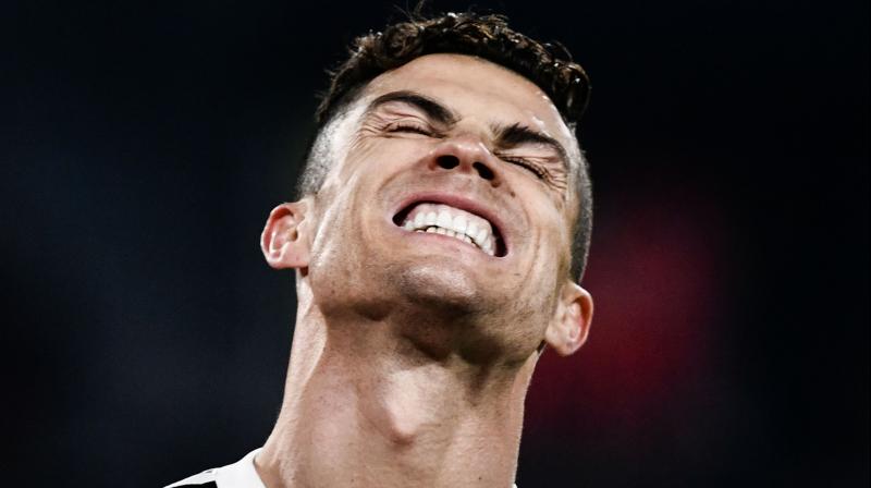 Cristiano Ronaldo was fined 20,000 euros ($22,738) by UEFA on Thursday for mimicking Atletico Madrid coach Diego Simeones crotch-grabbing celebration in Juventus Champions League last-16 win last week. (Photo: AFP)