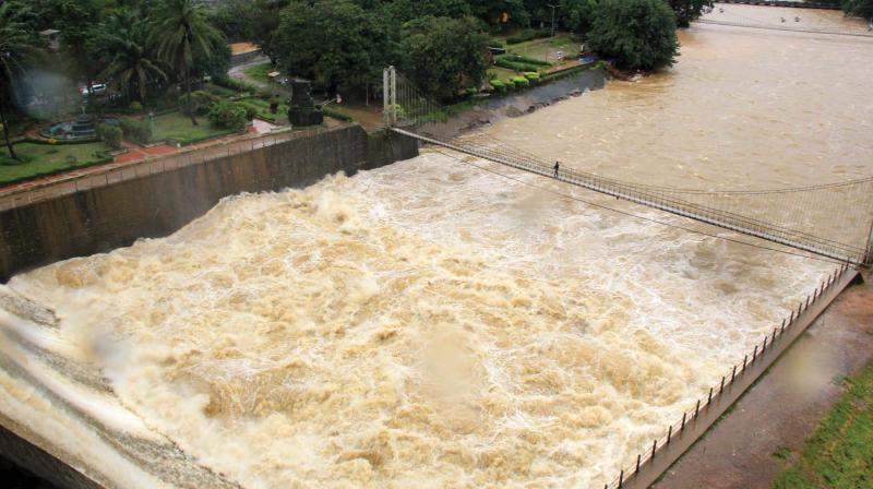 Water gushing out of the spill way of Malampuzha Dam Gardens near the hanging bridge when the shutters were raised from 45 to 80 cm on Tuesday. (Photo: DC)