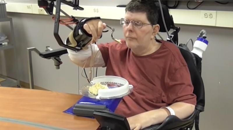 Using the brain interface system, he can now move each joint in his right arm individually, just by thinking about it.