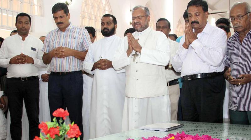 Jalandhar bishop Franco Mulakkal prays at the tomb of St Alphonsa before going at CJM court at Pala in Kottayam on Friday.  (RAJEEV PRASAD)
