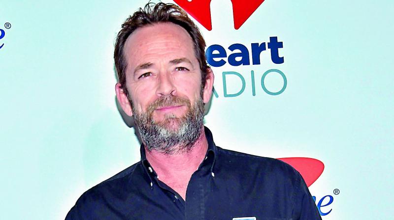 Luke Perry was buried in an eco-friendly suit