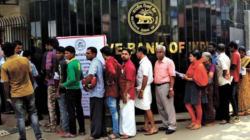 Customers queue up outside the Reserve Bank office in Thiruvananthapuram  on Thursday.  (Photo: Peethambaran Payyeri)