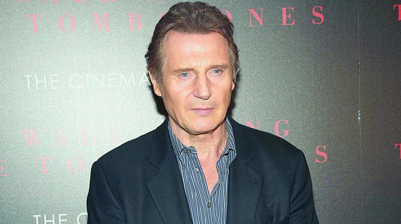 Liam Neeson apologises