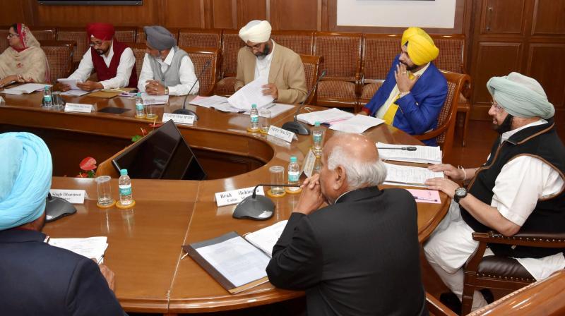 Punjab Chief Minister Captain Amarinder Singh presiding over the Cabinet meeting at Punjab Bhawan, in Chandigarh on Saturday. (Photo: PTI)