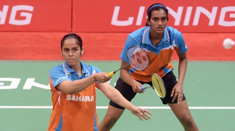PV Sindhu and Saina Nehwal will share the responsibility in the womens singles events at the Asian Mixed Team Championship. (Photo: AFP)