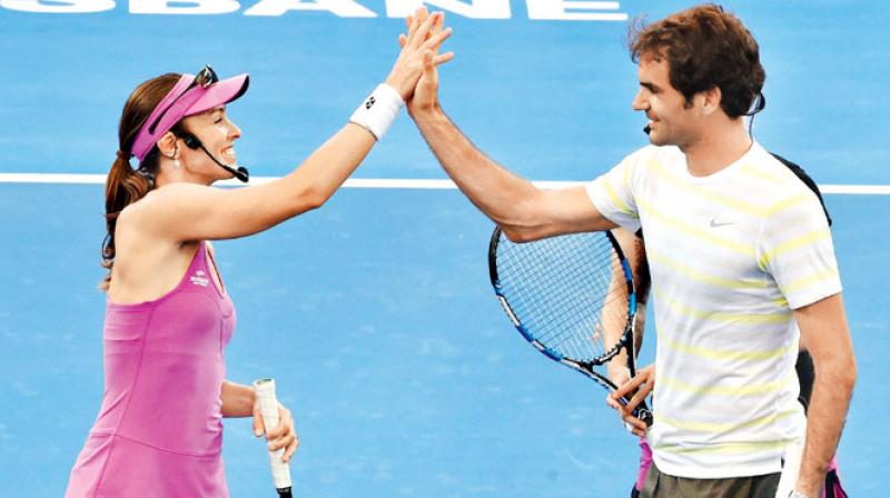 Federer said that  Martina was partially the one who showed him how it was all done. (Photo:AP)