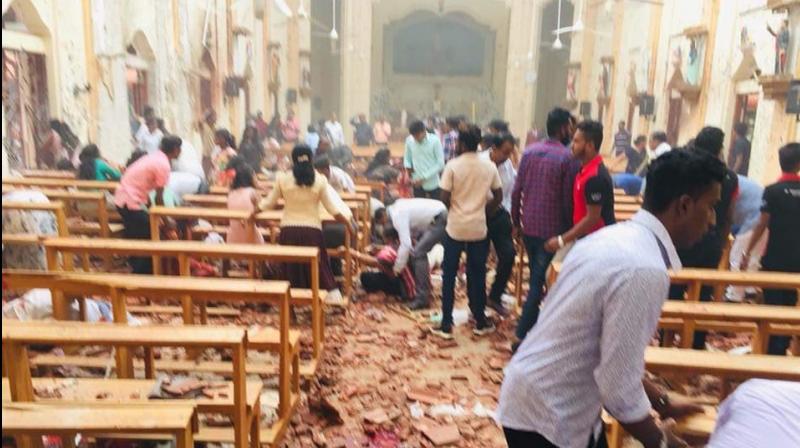 7 arrested after eight blasts in Sri Lanka; death toll rises to 215