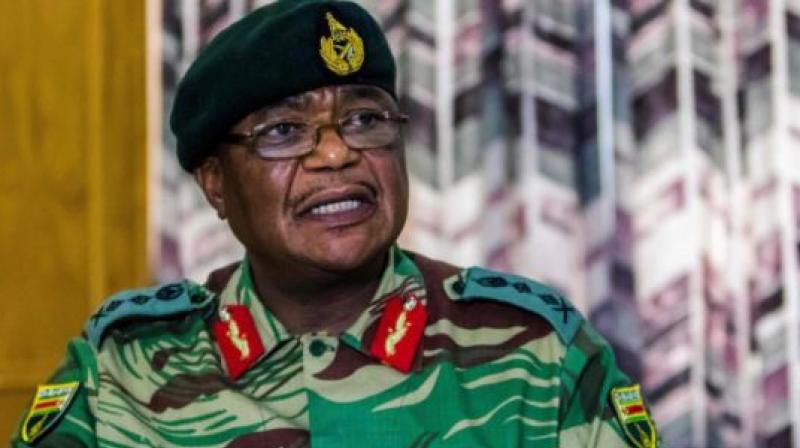 Zimbabwe Army General Constantino Chiwenga Commander of the Zimbabwe Defence Forces addresses a media conference held at the Zimbabwean Army Headquarters on November 13, 2017 in Harare. (Photo: AFP)