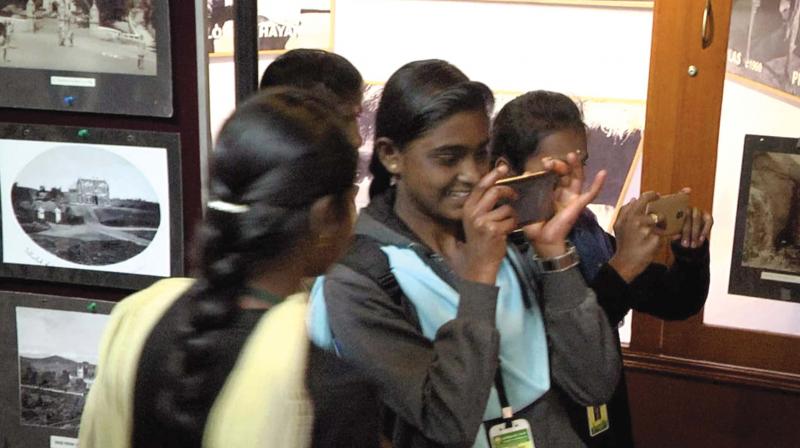 Young girls taking snaps of the display at the  exhibition venue. (DC)