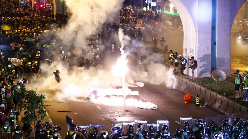 45 injured as Hong Kong protest escalates, triad gangs seen on streets