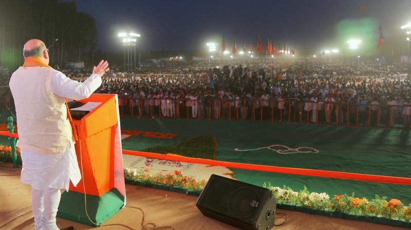 BJP President Amit Shah addressing a gathering. (Photo: PTI)