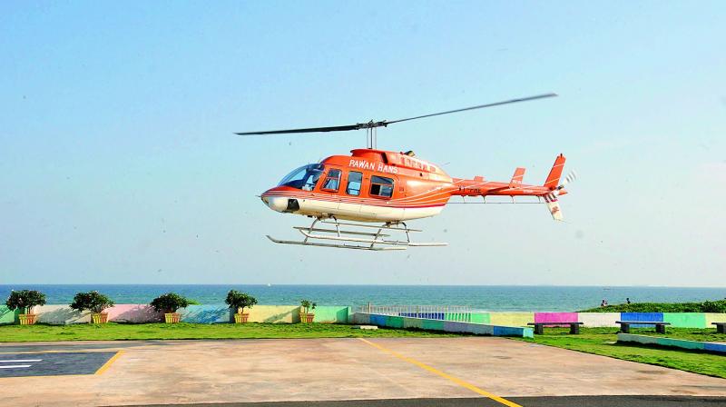 A Pawan Hans helicopter takes off from the helipad inside VUDA Park as part of a trail-run for a Tourism project on Thursday. (Photo: DC)