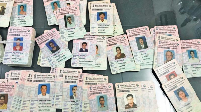 The Election Commission Flying Squad intercepted a car with the DMK flag on the bonnet on Medavakkam main road Tuesday morning and seized 270 voter ID cards relating to South Chennai Lok Sabha  constituency, where Tamilachi Thangapandian is the DMK candidate. Police arrested seven DMK members in this connection. (Image DC)