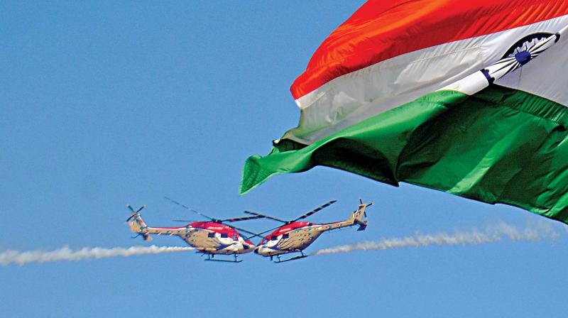 Defence helicopters perform live demonstration at DefExpo in Thirvidanthai near Chennai, on Friday. (Photo:DC)