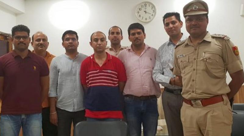 Army Major Nikhil Handa (in red t-shirt), arrested, in relation to the murder of another Majors wife, from Uttar Pradeshs Meerut. (Photo: PTI)