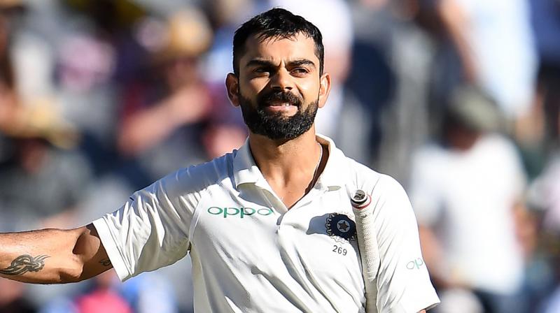 Virat Kohli received treatment from the physio on day two of the Melbourne Test against Australia last week, appearing to be in pain just before he was out for 82 in the first innings. (Photo: AFP)