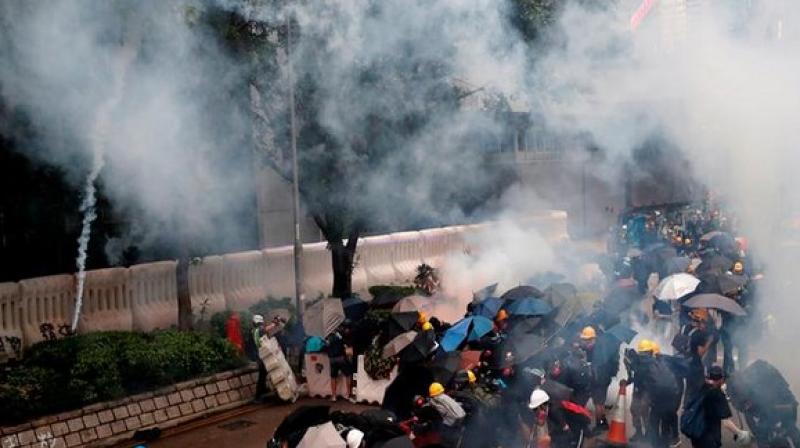Hong Kong protest heats up; police fire teargas, rubber bullets to dispel crowd