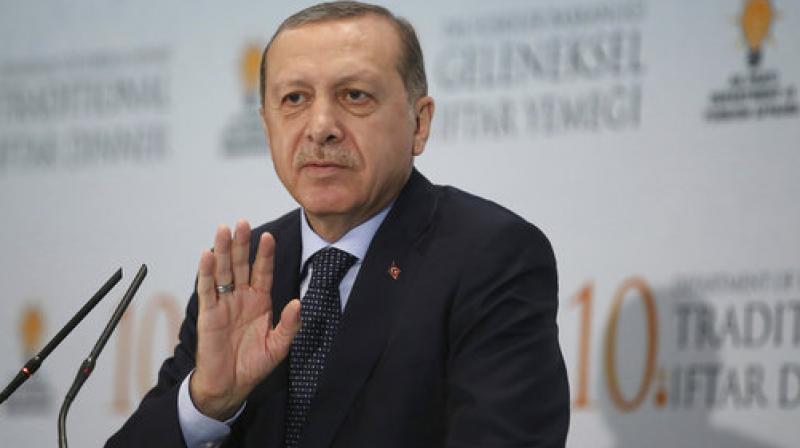 Turkeys President Recep Tayyip Erdogan addresses foreign ambassadors at a Ramadan dinner in Ankara, Turkey. Erdogan has voiced support for Qatar in its dispute with Saudi Arabia and other nations, saying no one will benefit from the policy of isolating the oil-rich nation. (Photo: AP)