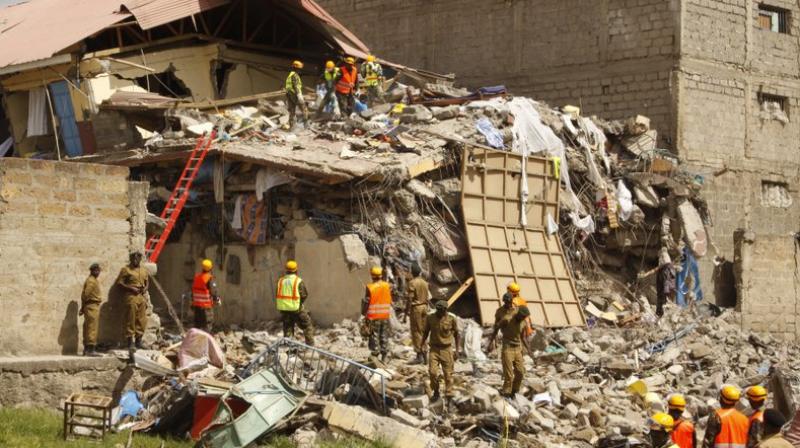 Rescuers work at the site of a building collapse in Nairobi, Kenya Tuesday. Nairobi Police Chief Japheth Koome said Tuesday that at least 10 people had been reported missing after the collapse Monday night. (Photo: AP)