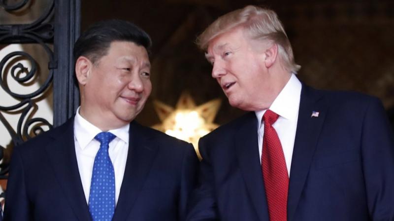 Xi Jinping with Donald Trump. (Photo: AP)