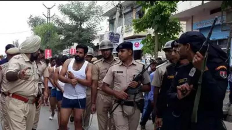 13 men paraded semi-naked by Rajasthan cops for helping gangster flee from lock-up