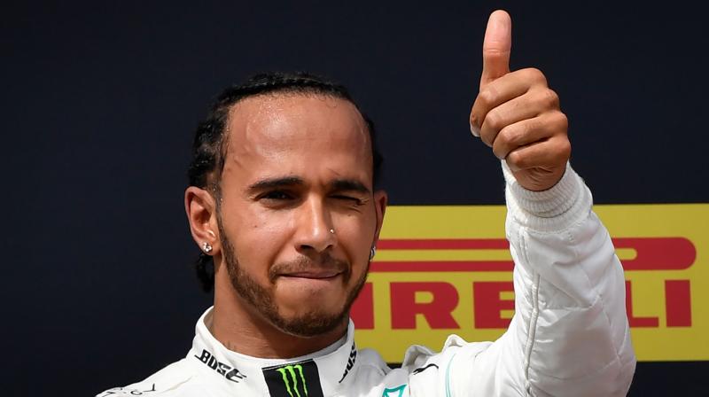The win also marked Hamiltons sixth triumph in eight races this season. (Photo: AFP)