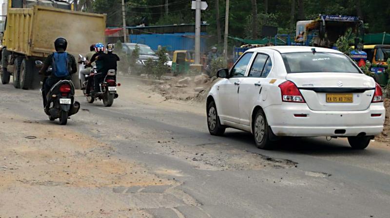 The bumpy surface and deep potholes have made the road a nightmare for motorists and accidents are frequent. The dug up stretches become even more dangerous when it rains.