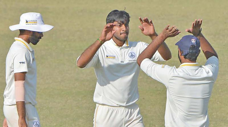 Tamil Nadus Vijay Shankar, who took four Mumbai wickets, celebrates a  dismissal.