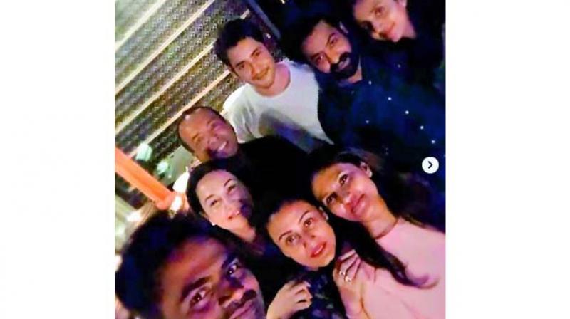 Mahesh Babu and Jr NTR party with their director and his wife