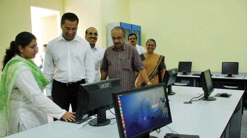 The file picture shows Pradeep Kumar, MLA, visiting Government Vocational Higher Secondary School for Girls at Nadakkavu after inaugurating PRISM project. The project turned schools computer lab into a sophisticated one. (Photo:  DC)