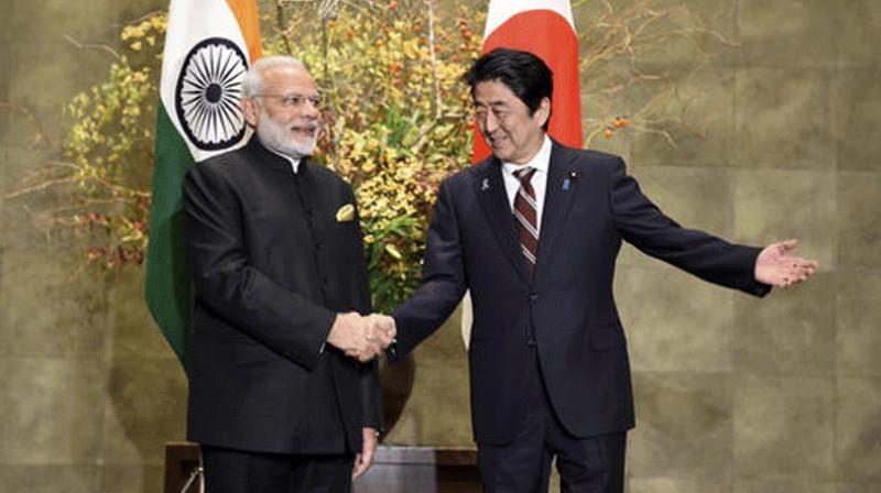 Prime Minister Narendra Modi with Japanese Prime Minister Shinzo Abe during his ceremonial welcome in Tokyo on Friday. (Photo: PTI)
