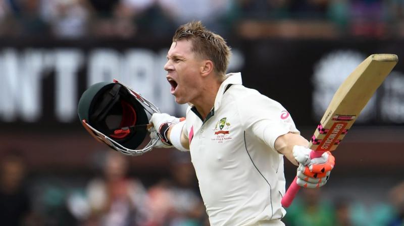 Warner will lower the sweet spot of his bat and have a heavier blade to tackle the lower bounce and sharp turn generated by the Indian spinners. (Photo: AFP)