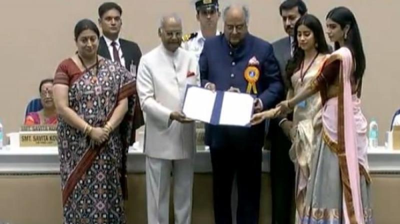 President Ram Nath Kovind presented the National Award for best actor (female) to Sridevi (posthumously) for the movie MOM. The award was received by her husband Boney Kapoor and daughters Janhvi and Khushi Kapoor. (Photo: ANI | Twitter)