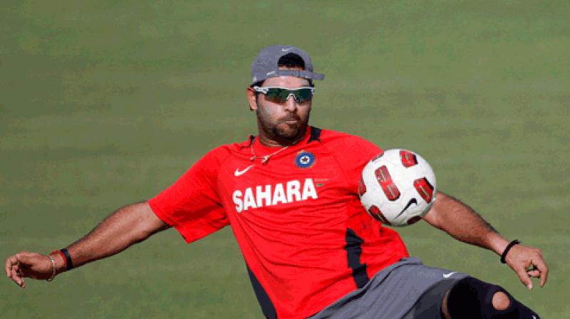 The Indian team also plays football as a part of its warm-up and the witty Yuvraj provided his expert comments on his teammates football skills. (Photo: AP)
