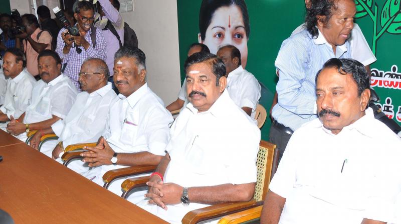 Chief Minister Edappadi K. Palaniswami and Deputy Chief Minister O. Panneerselvam at an AIADMK party meet in Chennai on Monday (Photo: DC)