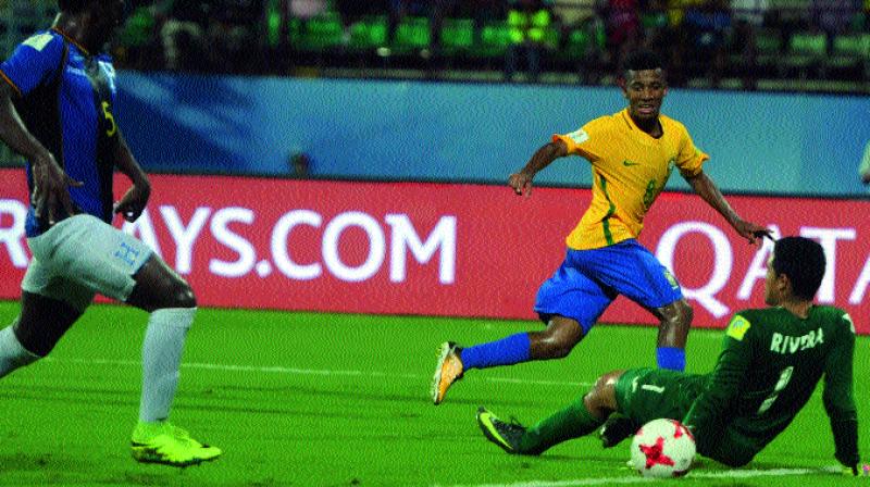 Brazils Marcos Antonio scores in their Round of 16 match against Honduras at the Jawaharlal Nehru Stadium in Kochi on Wednesday. Brazil won 3-0. They face Germany in the quarter-finals in Kolkata on October 22. (Photo: SUNOJ NINAN MATHEW)