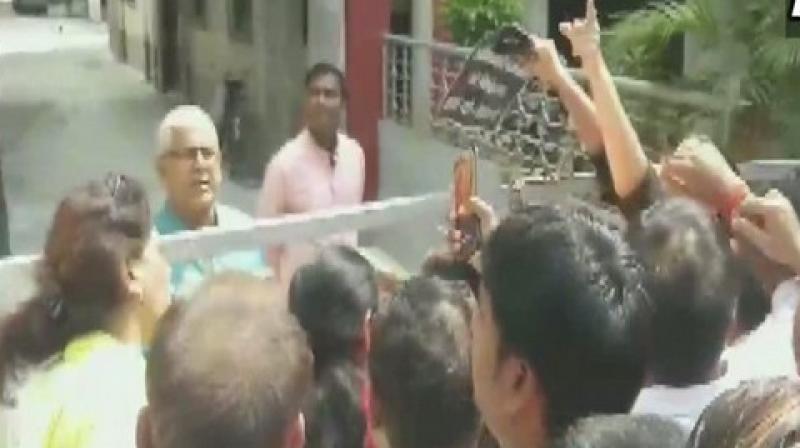 Bihar Floods: Locals protest outside Deputy CM Sushil Kumar Modi residence in Patna