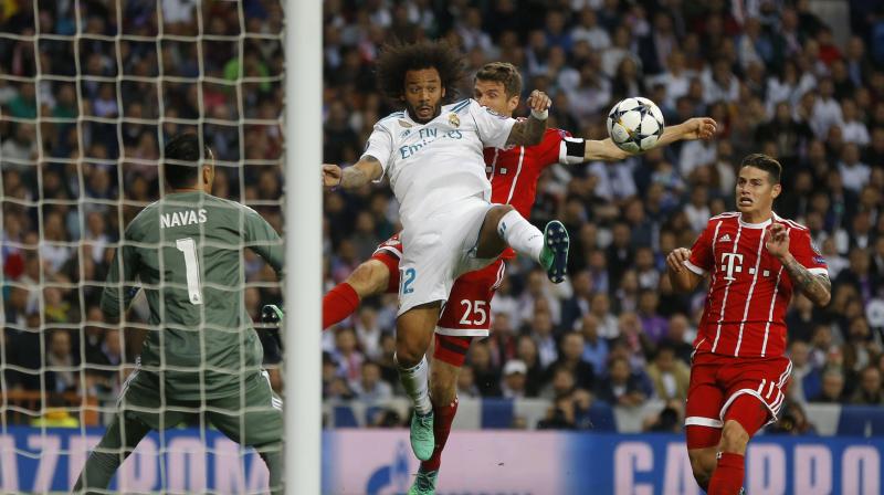 The Bundesliga champions also had a penalty appeal waved away when their Polish striker Robert Lewandowski went down under a challenge from Real captain Sergio Ramos. (Photo: AP)