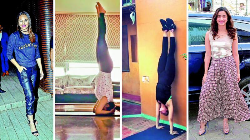 Sonakshi Sinha does a headstand and Alia Bhatt does a handstand