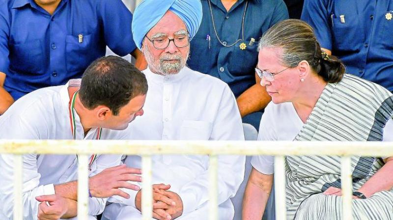 Former Congress president Sonia Gandhi, former Prime Minister Manmohan Singh (C) and Congress President Rahul Gandhi (L) during Bharat Bandh protest.	PTI called by Congress and other parties against fuel price hike and depreciation of the rupee, in New Delhi, Monday, Sept 10, 2018. (PTI Photo)