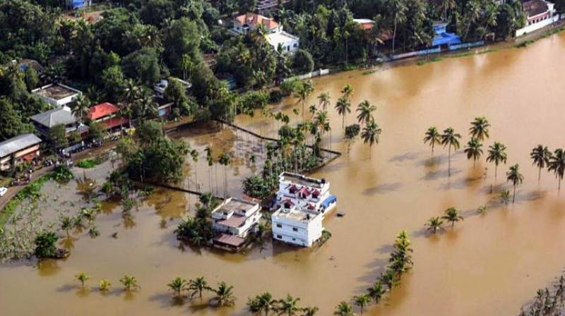 An aerial view of the flooded locality of Aluva after heavy rains, in Kerala (Photo: PTI)