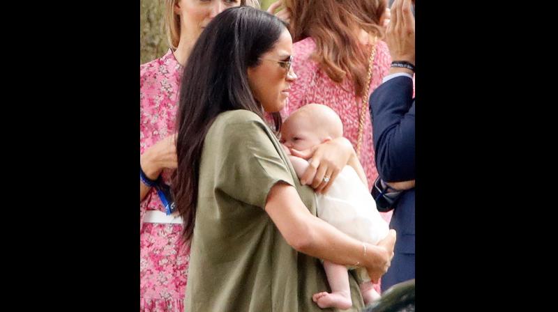 Meghan Markle mom-shamed for awkwardly carrying her baby