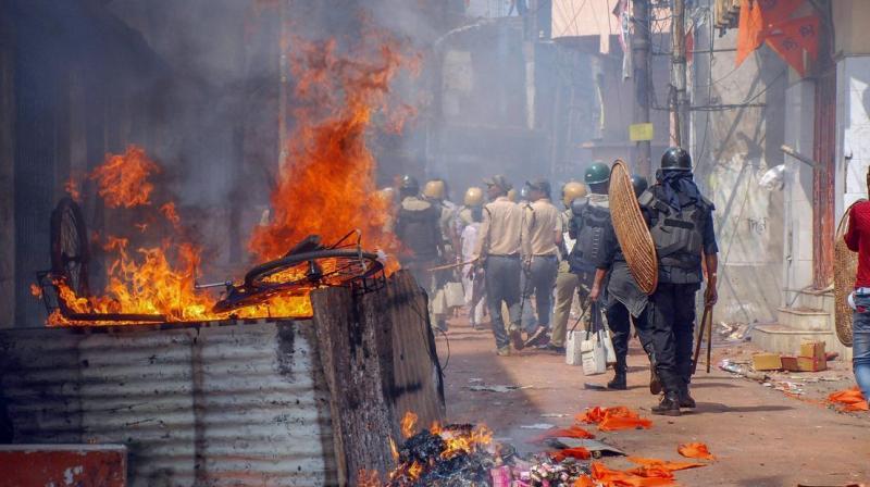 Expressing its serious concern over the clashes the NHRC issued the notices to state chief secretary Malay De, state home secretary Atri Bhattacharya and state director general of police Surajit Kar Purkayastha. (Photo: PTI)