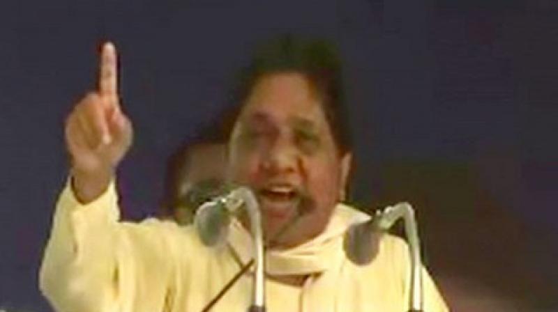 The BSP supremo appealed to his party cadre to forget their differences with the SP people. (Photo: ANI)