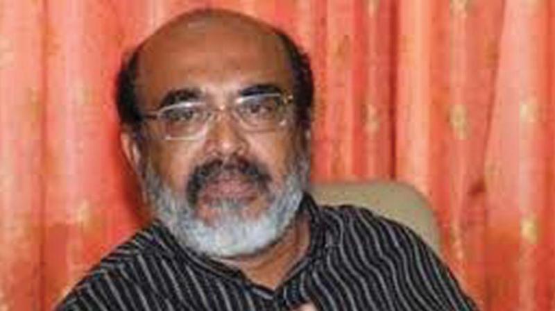 Finance minister Dr T M Thomas Isaac