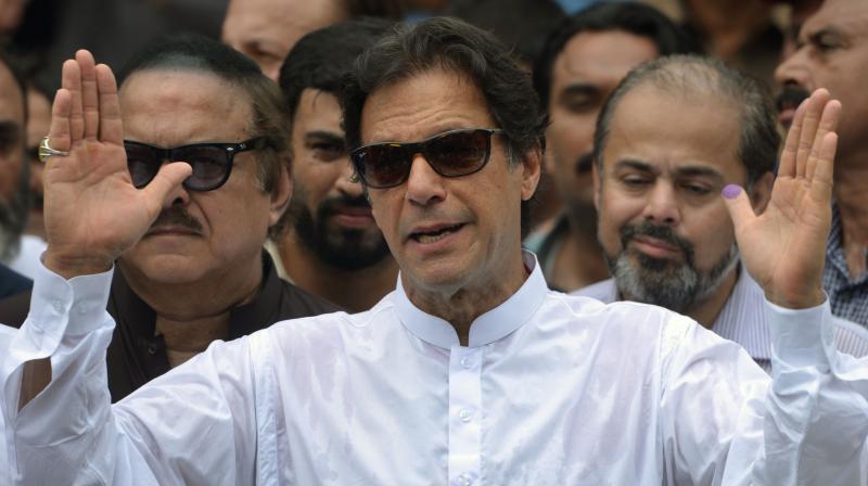 Fawad Chaudhry, spokesperson of Imran Khans Pakistan Tehreek-e-Insaf (PTI), said that Imran Khan will invite all members of the 1992 World Cup-winning Pakistani cricket team for his oath-taking ceremony as Pakistan Prime Minister. (Photo: AFP)