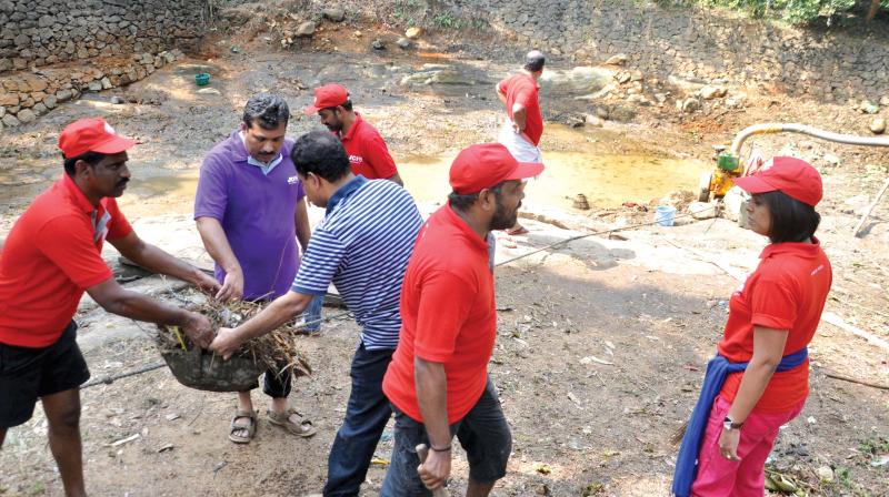 Volunteers of Anbodu Kochi, a social media group, clean up a pond in Thiruvaniyoor near Kochi  as part of the second phase of the Ente Kulam Ernakulam project. The project is an attempt to spread awareness on importance of pond restoration. (file pic)