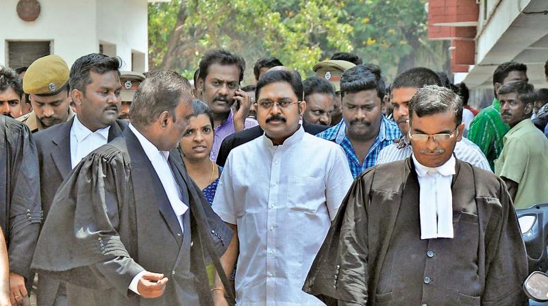 AIADMK deputy general secretary T.T.V Dhinakaran comes out of the Allikulam Egmore court complex on Wednesday. (Photo: DC)