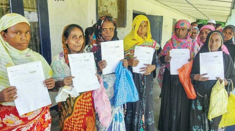 Women queue up to verify their names in the final draft of the National Register of Citizens at Morigoan. ( Photo: PTI)